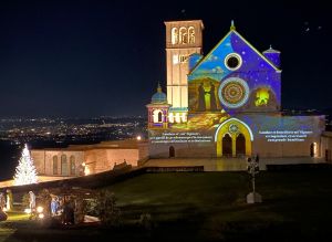 <div class="buttonTitle"><div class="roundedlIcon white mbianco mprest"></div></div>Magical Illumination in Assisi at Christmas